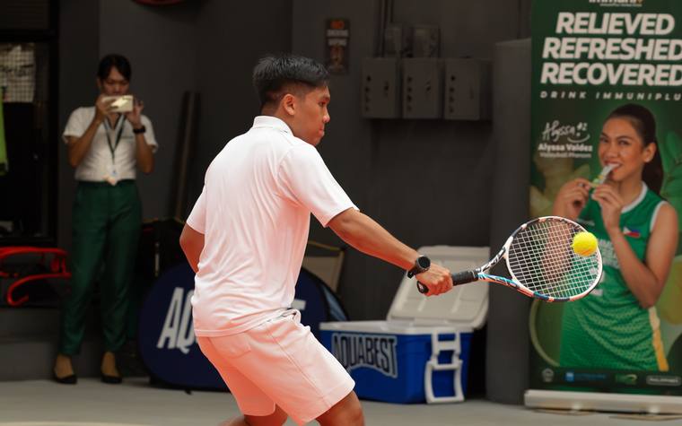 Player hitting a backhand