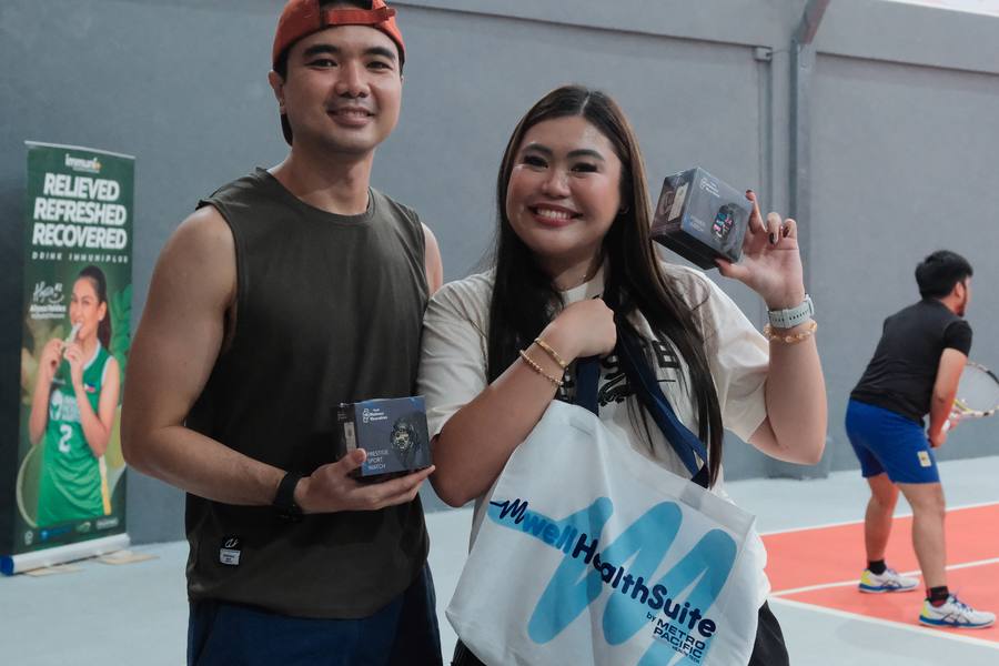 Members with partner giveaways on court
